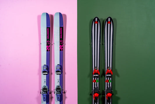 Vibrant Salomon Skis on Pink & Green Walls: A Modern Storage Statement